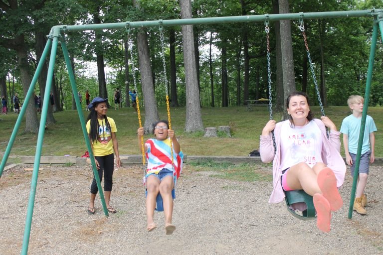 Kids swinging on a playground