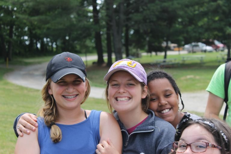 Teen girls smiling at Camp Burton